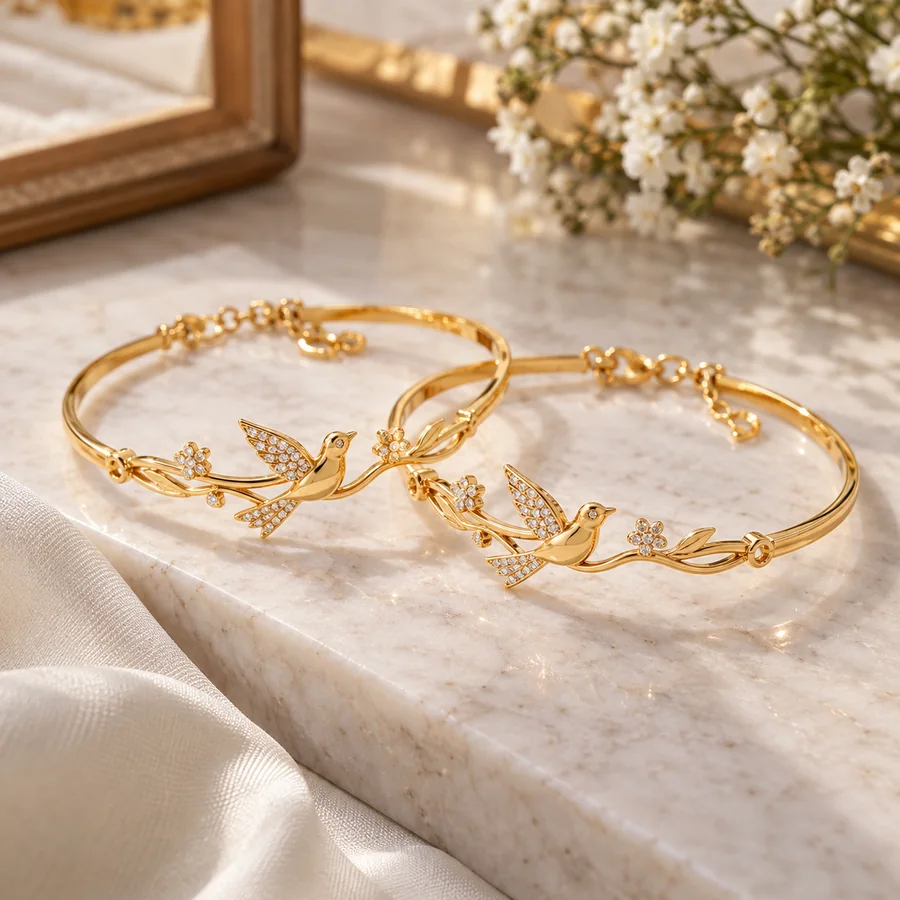 Lắc tay đôi uyên ương vàng 18K